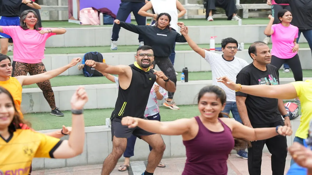 people performing in fitness event